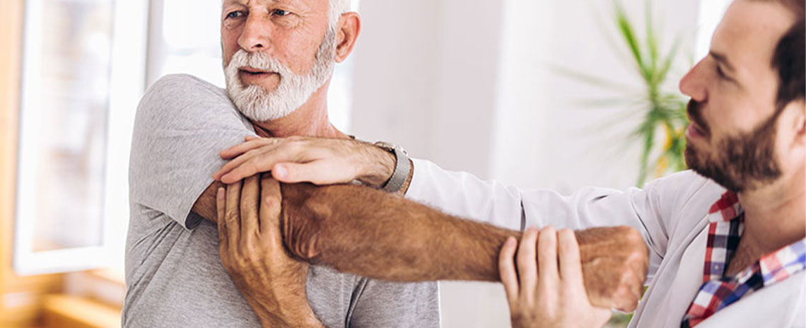 Patient getting a chiropractic shoulder adjustment at Encinitas Auto Accident Injury Center in Encinitas